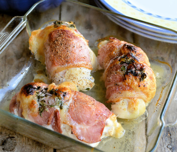 Bacon Wrapped Chicken With Goats Cheese And Basil Served With Mixed